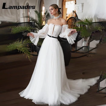Изысканное свадебное платье без бретелек с замысловатыми кружевными деталями, эффектным сетчатым лифом и длинными рукавами, идеальное свадебное платье